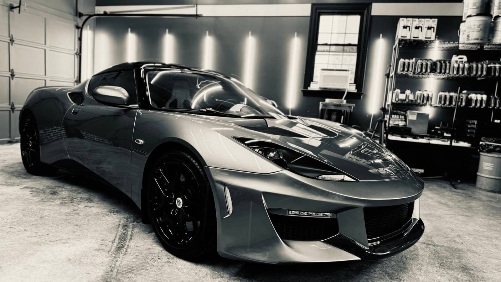 Lotus Evora in the shop, black and white